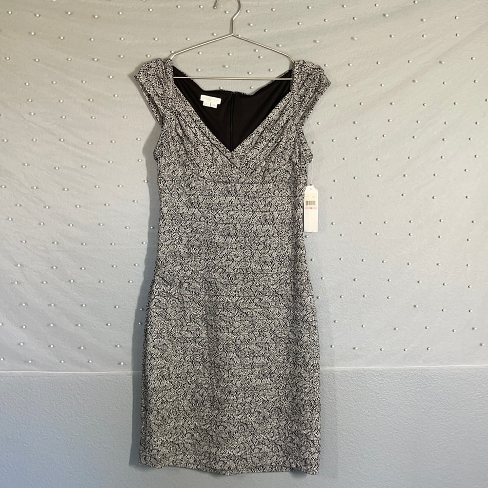 Versatile pleated print dress.